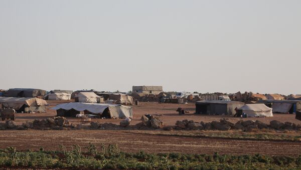 Un campo de refugiados en Siria - Sputnik Mundo