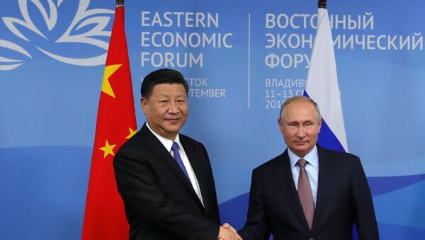 El presidente de China, Xi Jinping, y presidente de Rusia, Vladímir Putin - Sputnik Mundo