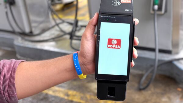 Aparato electrónico inalámbrico del nuevo sistema de pago en gasolineras de Caracas - Sputnik Mundo