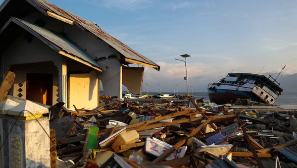 Consecuencias del tsunami en Indonesia - Sputnik Mundo
