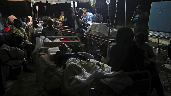 Personas heridas tras el terremoto en Haití - Sputnik Mundo