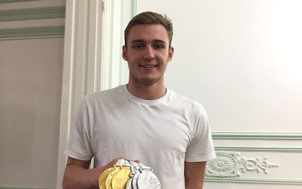 Daniil Markov, integrante del equipo juvenil de natacion de Rusia - Sputnik Mundo