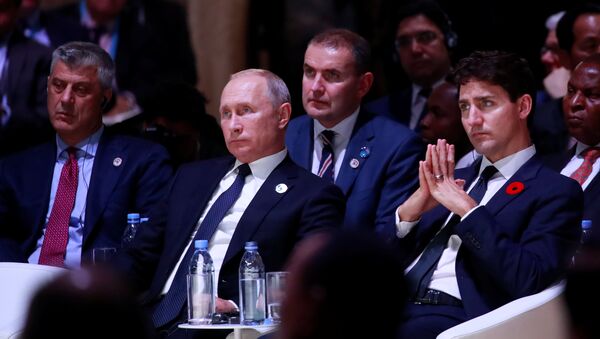 Hashim Thaci y Vladímir Putin durante el centenario del fin de la Primera Guerra Mundial en París - Sputnik Mundo