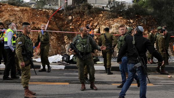 Fuerzas de Defensa israelíes en el lugar del ataque en Cisjordania - Sputnik Mundo