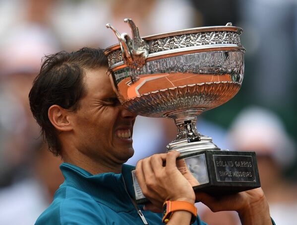 El 10 de junio el tenista español Rafael Nadal conquistó su undécimo título del Torneo de Roland Garros, asegurando su posición como el máximo triunfador de la historia de la competencia sobre tierra batida más prestigiosa del mundo. - Sputnik Mundo