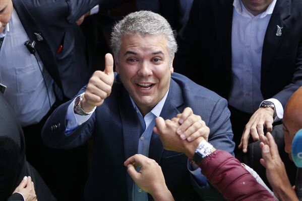 En Colombia el candidato Iván Duque, del partido Centro Democrático, fue elegido presidente del país el 17 de junio en un balotaje contra Gustavo Petro, de Colombia Humana. - Sputnik Mundo