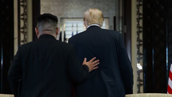 Kim Jong-un, líder norcoreano, y Donald Trump, presidente de EEUU - Sputnik Mundo