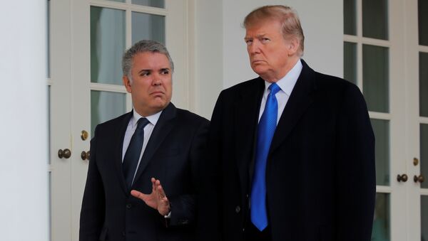 Iván Duque, presidente de Colombia y Donald Trump, presidente de EEUU - Sputnik Mundo