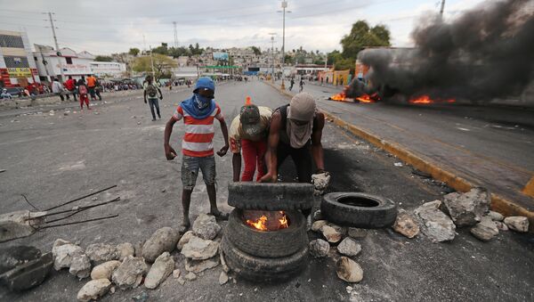 Protestas en Haití - Sputnik Mundo
