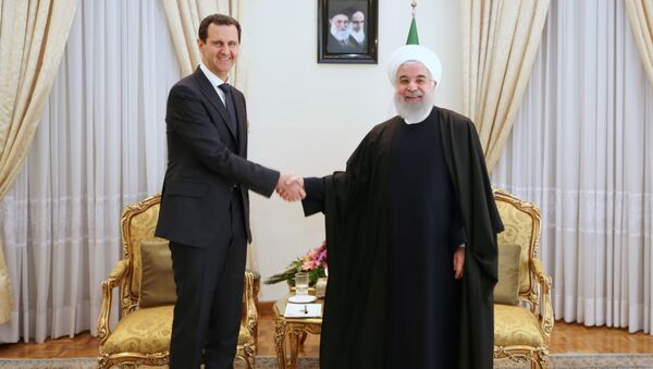 Presidente sirio, Bashar Asad, y presidente de Irán, Hasán Rohaní - Sputnik Mundo