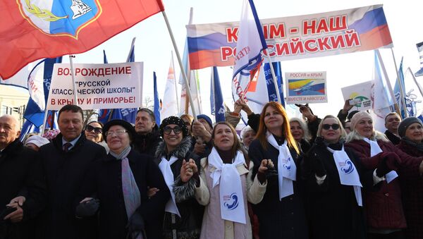 Una marcha en conmemoración a los 5 años de la reunificación de Crimea a Rusia - Sputnik Mundo