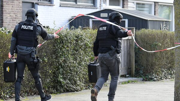 Policías en el lugar del tiroteo en la ciudad de Utrecht, Países Bajos - Sputnik Mundo