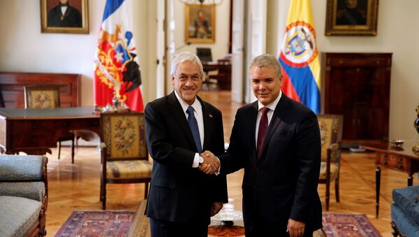 El presidente de Colombia, Iván Duque, y su homólogo chileno, Sebastián Piñera, en Santiago, Chile - Sputnik Mundo