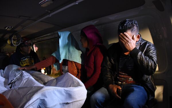 Familiares de las víctimas del accidente de tránsito en Guatemala - Sputnik Mundo