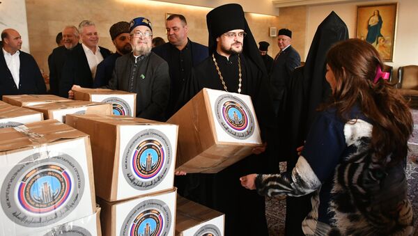 Entrega de los organismos religiosos rusos de 15 toneladas de ayuda humanitaria a Siria - Sputnik Mundo