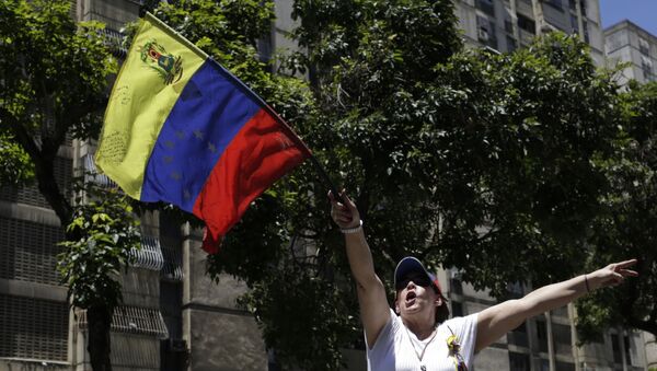 Una manifestación opositora en Caracas - Sputnik Mundo