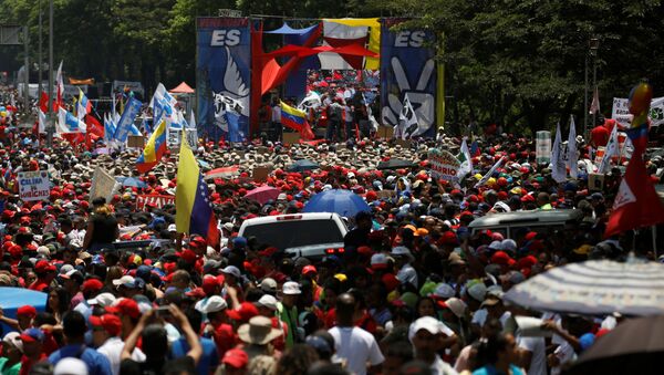 Una marcha en Caracas, Venezuela - Sputnik Mundo