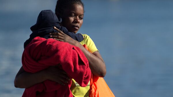 Una migrante de Libia (imagen referencial) - Sputnik Mundo