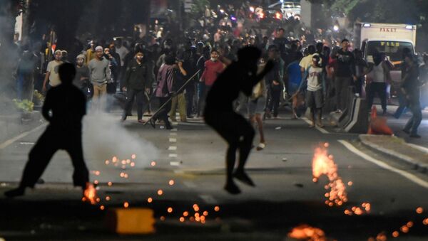 Protestas en Indonesia - Sputnik Mundo