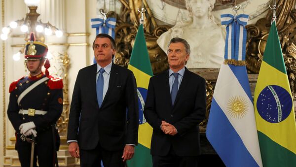 El presidente de Brasil, Jair Bolsonaro, con su par argentino, Mauricio Macri - Sputnik Mundo