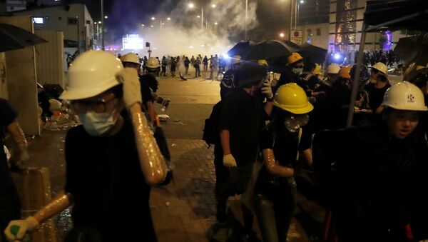 Manifestantes en las protestas de Hong Kong - Sputnik Mundo