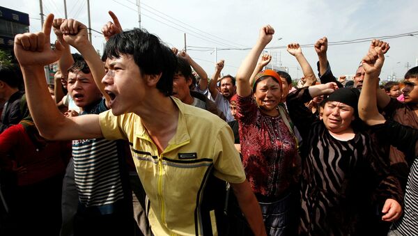 Las protestas étnicas en Xinjuang, región noroccidental de China - Sputnik Mundo