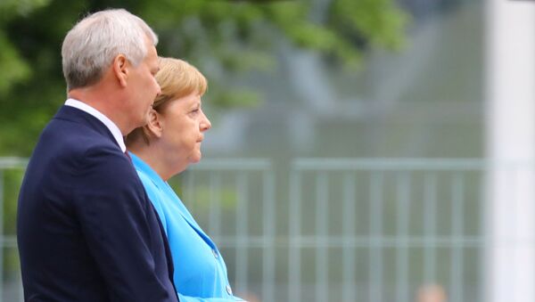 La canciller alemana, Angela Merkel, y el primer ministro finlandés, Antti Rinne - Sputnik Mundo