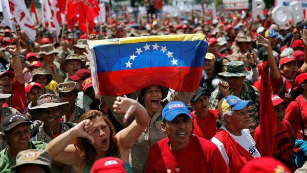 Protestas contra el informe de Bachelet en Caracas (Venezuela), el 13 de julio de 2019 - Sputnik Mundo