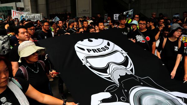 Las protestas de los periodistas en Hong Kong - Sputnik Mundo