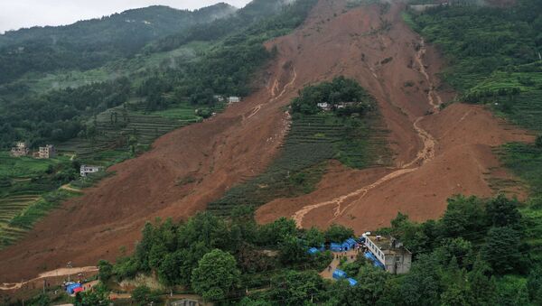 Deslizamiento de tierra en la provincia de Guizhou, China - Sputnik Mundo