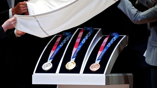 Las medallas de los Juegos Olímpicos de Tokio 2020 - Sputnik Mundo