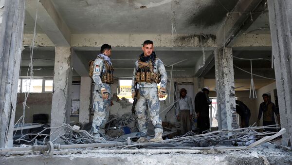 Las fuerzas de seguridad afganas en el lugar de la explosión (archivo) - Sputnik Mundo