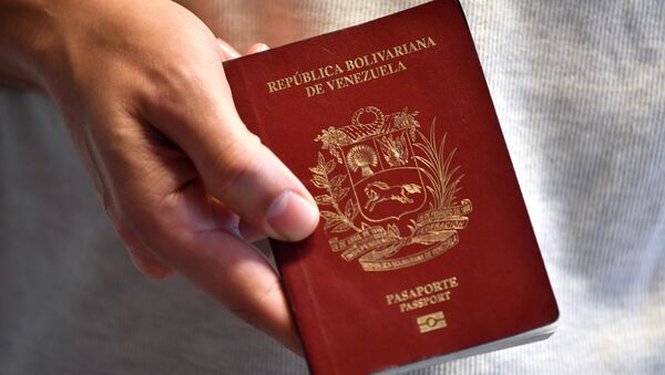 Un pasaporte venezolano - Sputnik Mundo