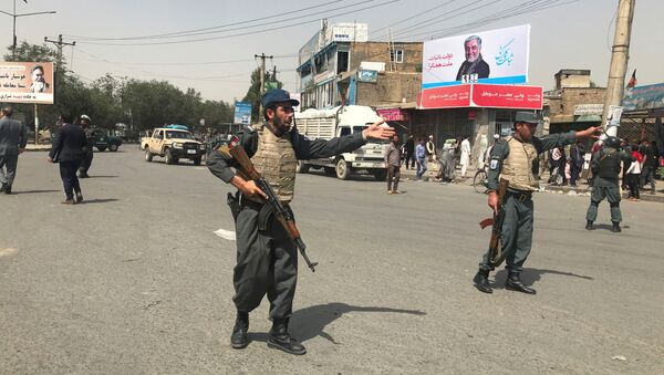 Policía afgana en el lugar de la explosión de un coche bomba - Sputnik Mundo