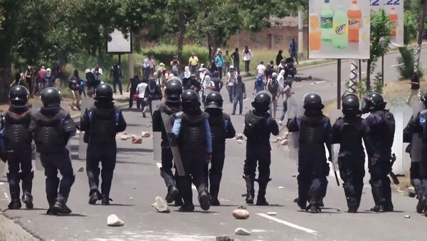 Enfrentamientos en Honduras en medio de la creciente ira contra el presidente - Sputnik Mundo