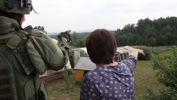 Los zapadores militares revisan la zona de la explosión en Áchinsk, Rusia - Sputnik Mundo