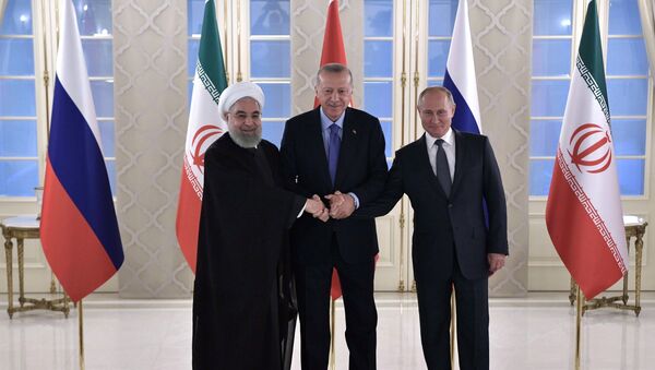 Recep Tayyip Erdogan, presidente de Turquía, recibe en Ankara a Hasán Rohaní, presidente de Irán, y Vladímir Putin, presidente de Rusia, el 16 de septiembre de 2019 - Sputnik Mundo
