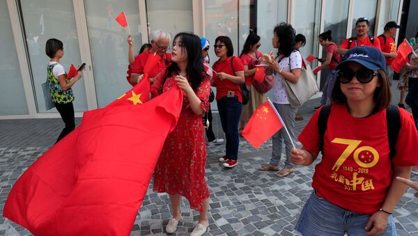 Los partidarios de Pekín marchan en Hong Kong - Sputnik Mundo