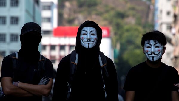 Manifestantes en Hong Kong - Sputnik Mundo