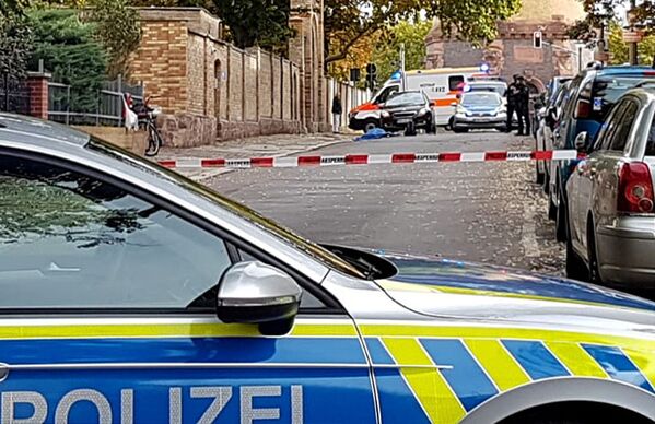 Tiroteos, policías en las calles y sirenas: la ciudad alemana de Halle tras la tragedia  - Sputnik Mundo
