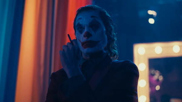 El actor Joaquin Phoenix en el papel del personaje Guasón —Joker— - Sputnik Mundo