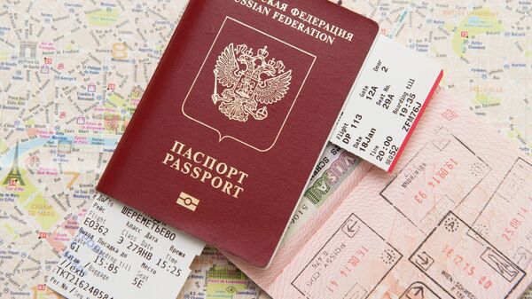 Un pasaporte ruso (imagen referencial) - Sputnik Mundo