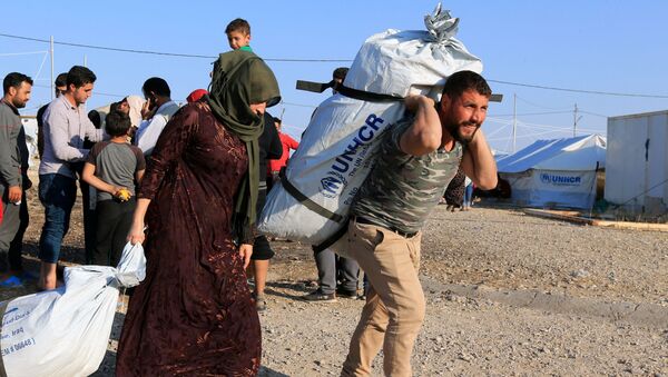 Refugiados sirios en Irak - Sputnik Mundo