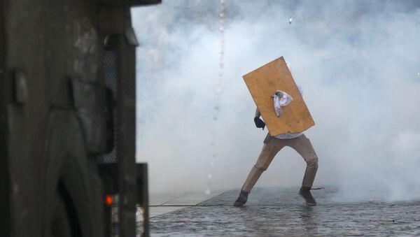 Las protestas en Santiago de Chile - Sputnik Mundo