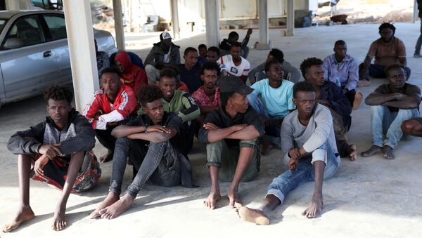 Migrantes libios - Sputnik Mundo