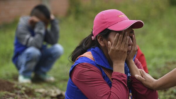 Familiares de los fallecidos durante la masacre del Cauca (Colombia), el 31 de octubre de 2019 - Sputnik Mundo
