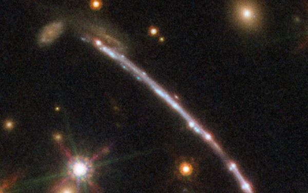 Galaxia Sunburst Arc - arco 2 - Sputnik Mundo