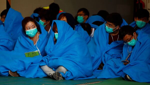 Manifestantes hongkoneses esperan la ayuda médica - Sputnik Mundo