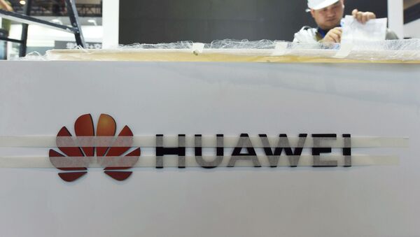 El logo de Huawei - Sputnik Mundo