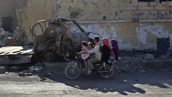 La vida cotidiana en Al Raqa, Siria - Sputnik Mundo